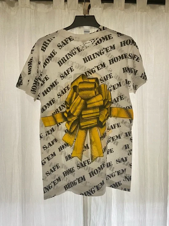 Vintage Screen Stars AOP “Bring’Em Home Safe” White Tee with Yellow Bow Graphic - Picture 3 of 4